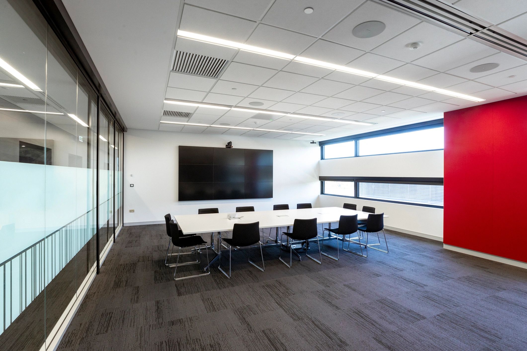 Modern conference room setting for cross-border legal strategy discussions