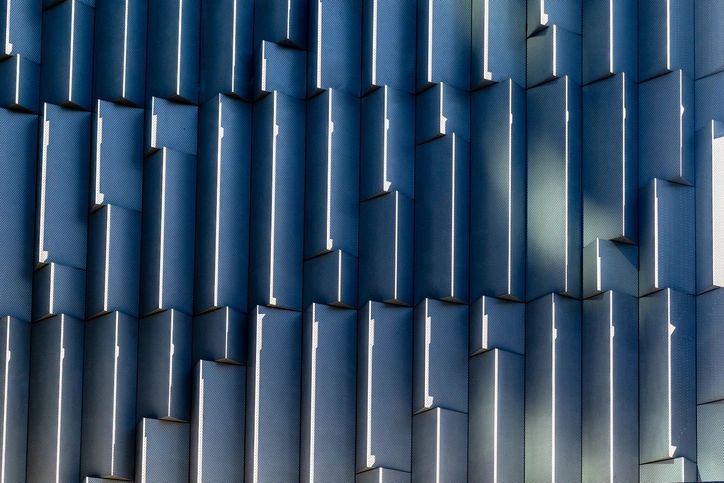 Abstract geometric architecture pattern in deep blue tones